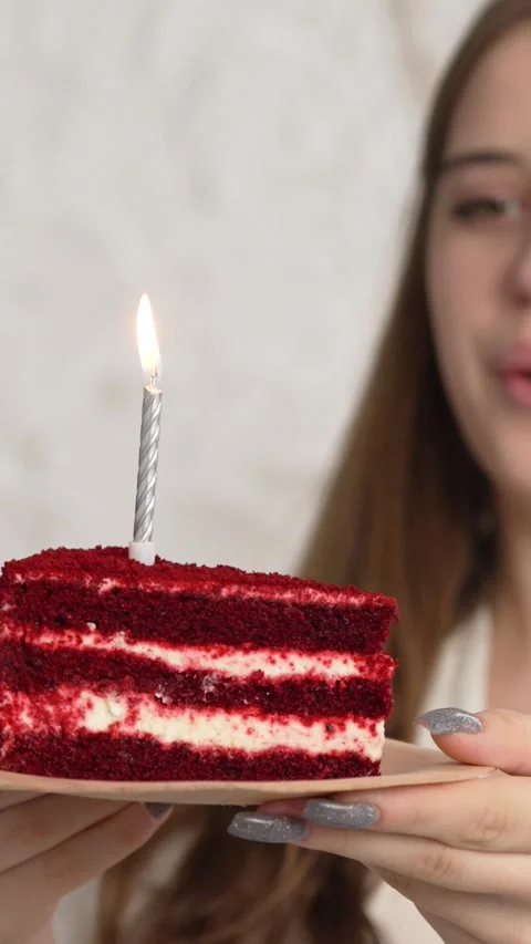 Vertical screen: Close-up of charming little girl with closed eyes making wish Stock Footage 263236996