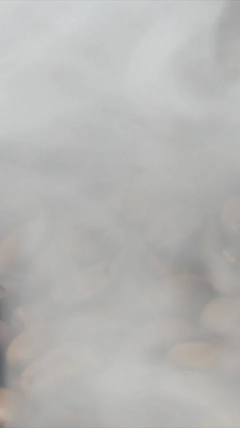 Vertical Screen: Close-up of roasted coffee beans. Aromatic coffee beans are Stock Footage 231261623