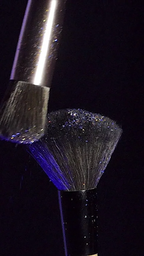 Vertical Screen: close up selective focus shot of shimmer powder being shaken Stock Footage 229966985