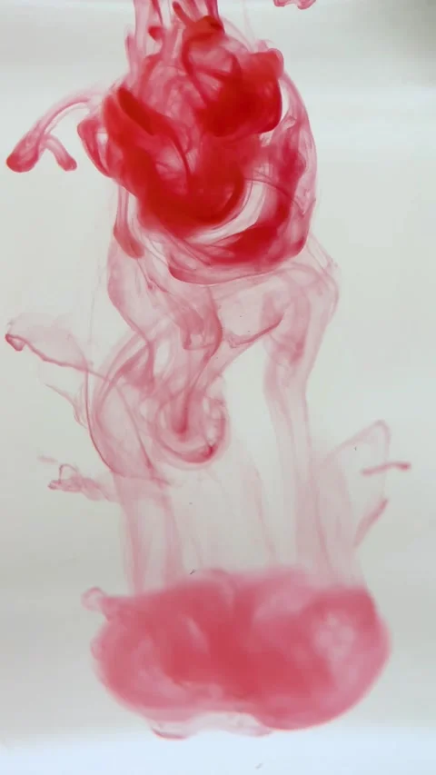 Vertical screen: Close-up shot. Red gouache clouds in water and move in slow Stock Footage 236034200