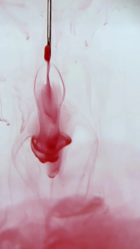 Vertical screen: Close-up shot. Red gouache clouds in water and move in slow Stock Footage 236755028