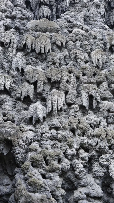 Vertical screen close up of textured stone surface with natural formations and r Stock Footage 318869357