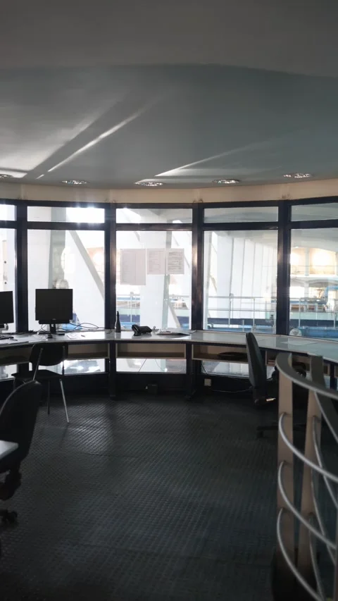 Vertical screen: Control room overlooking water treatment facility, with monitor Stock Footage 304884140