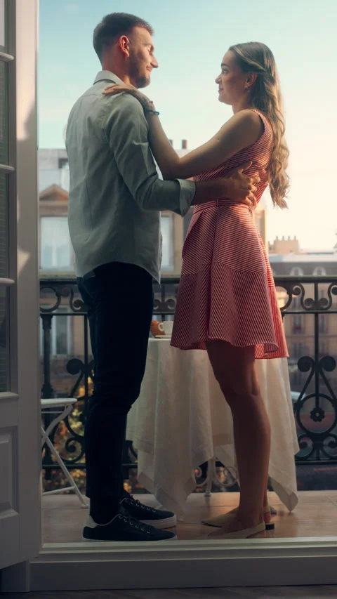 Vertical Screen Couple Dancing on Balcony in Paris Stock Footage 296173223