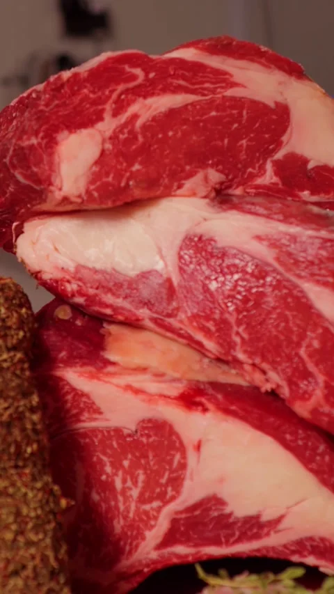 Vertical Screen Decorative layout of meat goods on display. Stock Footage 299954237