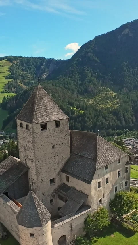 Vertical Screen Drone Sweep Over Hillside Castle And Green Valley In San Martino Stock Footage 325825515