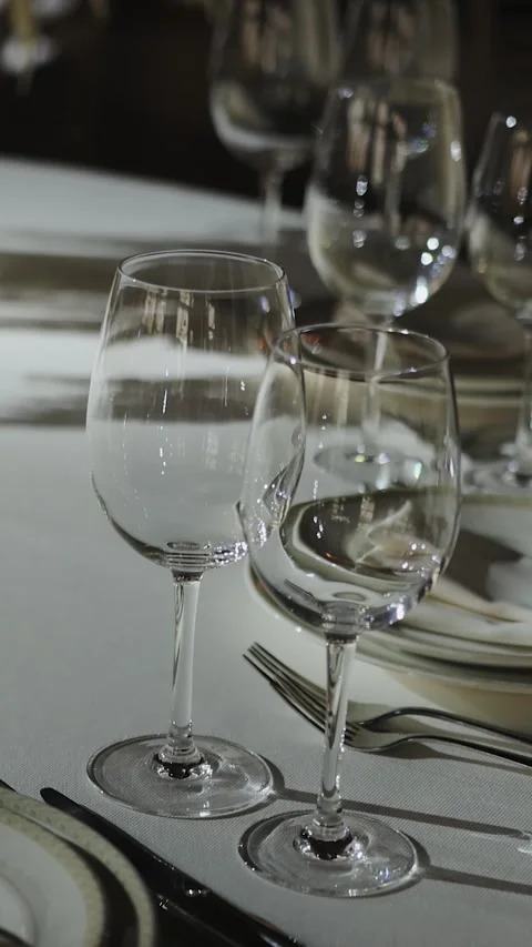 Vertical screen: Elegant wedding reception with beautifully arranged tables and Stock Footage 308396517