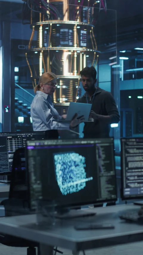 Vertical Screen Engineers Working with Quantum Computer Stock Footage 318966015