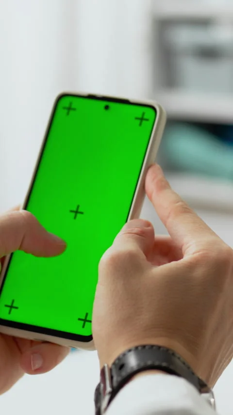 Vertical screen. Examination. A specialist in a white coat holds a smartphon Stock Footage 331737356
