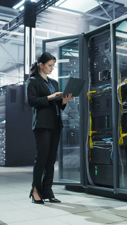 Vertical Screen Female Data Center Specialist Using Laptop Computer Stock Footage 320867521