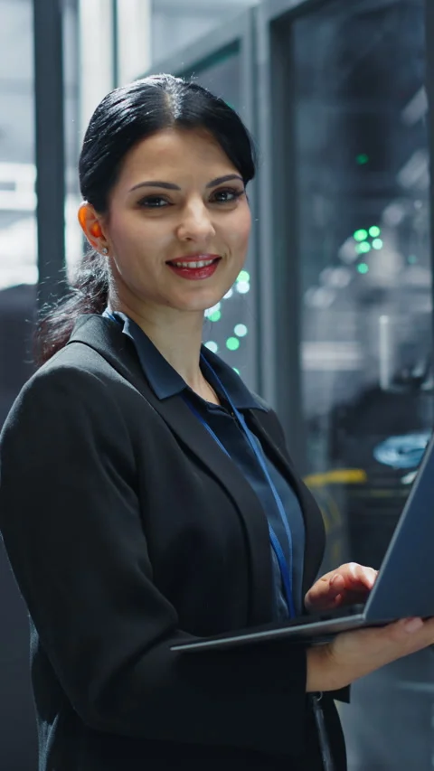 Vertical Screen Female Data Center Specialist Using Laptop Computer Stock Footage 320867720
