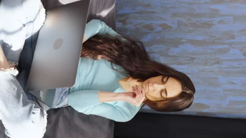 Vertical Screen: Female freelancer working on laptop at home Stock Footage 223422463