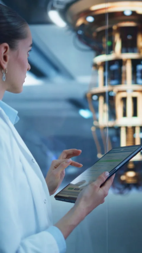 Vertical Screen Female Managing Quantum Computer with Tablet Stock Footage 318966541