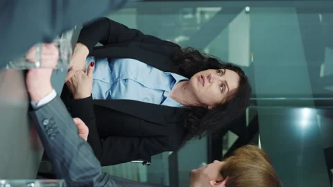 Vertical screen: Female top manager talking at business meeting Stock Footage 254152334