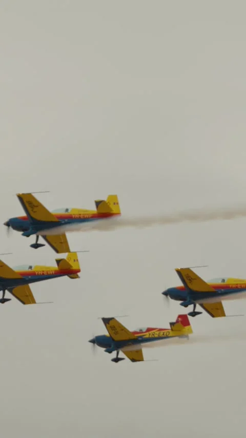 Vertical Screen Four planes from Hawks of Romania performing during the Stock Footage 303507550