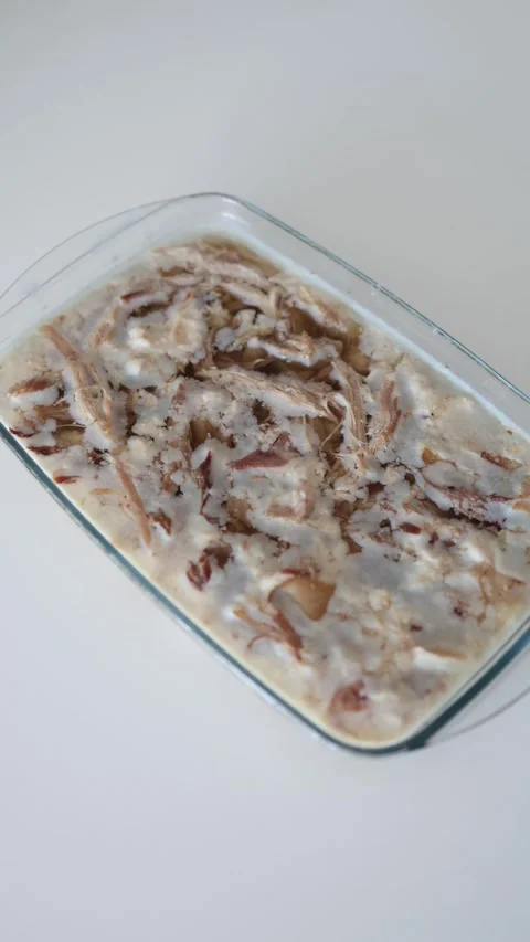 Vertical screen: A glass dish filled with homemade aspic, a traditional meat jel Stock Footage 304622976