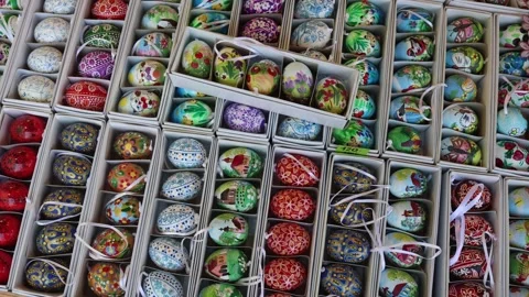 Vertical screen Hand painted Easter eggs with colorful floral and animal designs Stock Footage 306677699