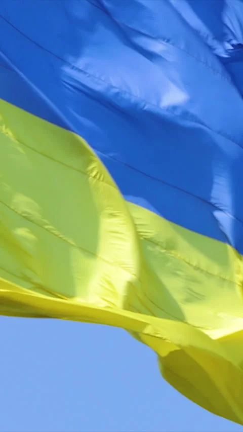Vertical Screen: Highly detailed fabric texture flag of Ukraine. Slow motion of Stock Footage 230035534