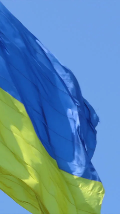 Vertical Screen: Highly detailed fabric texture flag of Ukraine. Slow motion of Stock Footage 230304535
