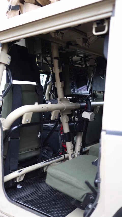 Vertical screen interior of tactical vehicle with reinforced frame joystick cont Stock Footage 311149708