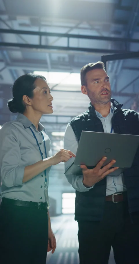 Vertical Screen IT Specialists Working in Data Center Stock Footage 320001857