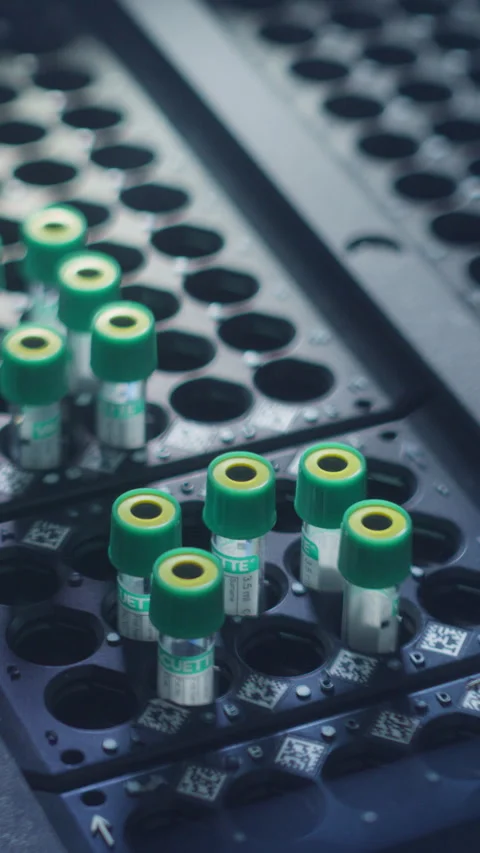 Vertical Screen Laboratory Machine Moving Test Tubes Stock Footage 296192030