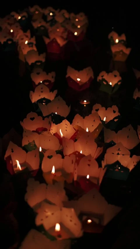 Vertical screen Lanterns Floating Peacefully. Festive Night With Glowing Stock Footage 332365331