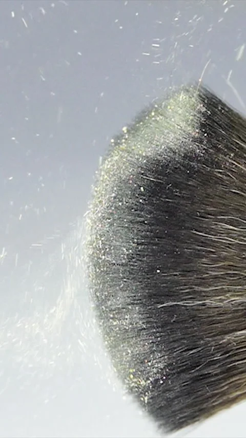 Vertical Screen: makeup brushes touch each other on a white background and small Stock Footage 230303988