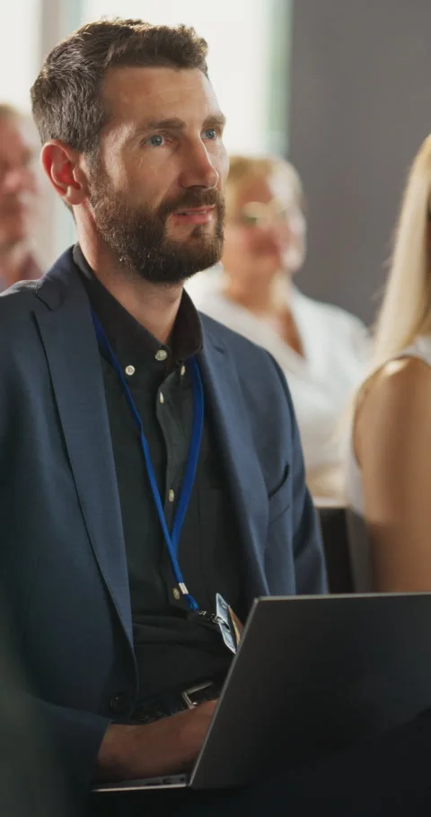 Vertical Screen Man Using Laptop At Business Conference Stock Footage 255844148