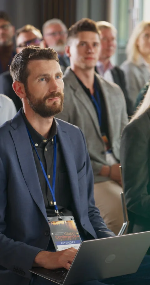 Vertical Screen Man Using Laptop At Business Conference Stock Footage 255844521