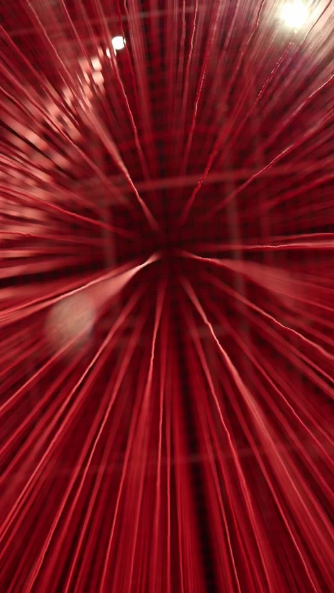 Vertical screen: A mesmerizing abstract backdrop featuring radiant red threads c Stock Footage 304459223