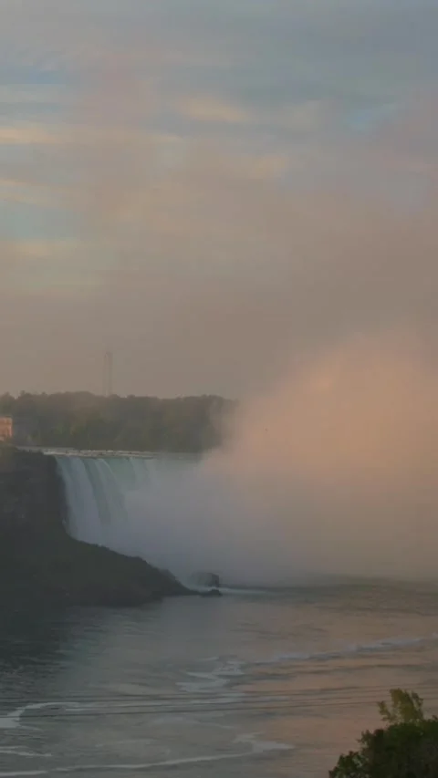 Vertical screen Niagara Falls at Sunset with Mist stunning sunset view of Video stock 296796748