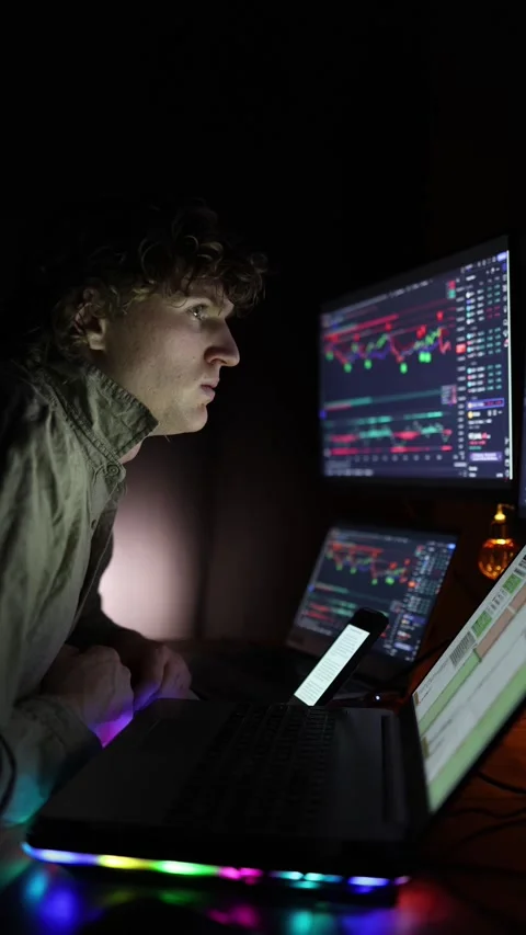 Vertical screen: A novice student explores cryptocurrency trading on multiple mo Stock Footage 297110068