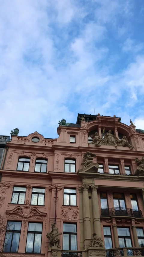 Vertical screen: Ornate pink building with classical sculptures and elegant colu Stock Footage 300161724