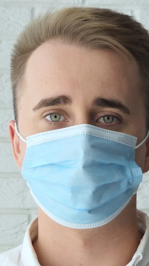 Vertical Screen: Portrait of a doctor or surgeon who looks proud, happy and Stock Footage 230165267