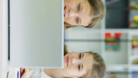 Vertical Screen: Pupils browsing internet in class searching for information Stock Footage 234197450
