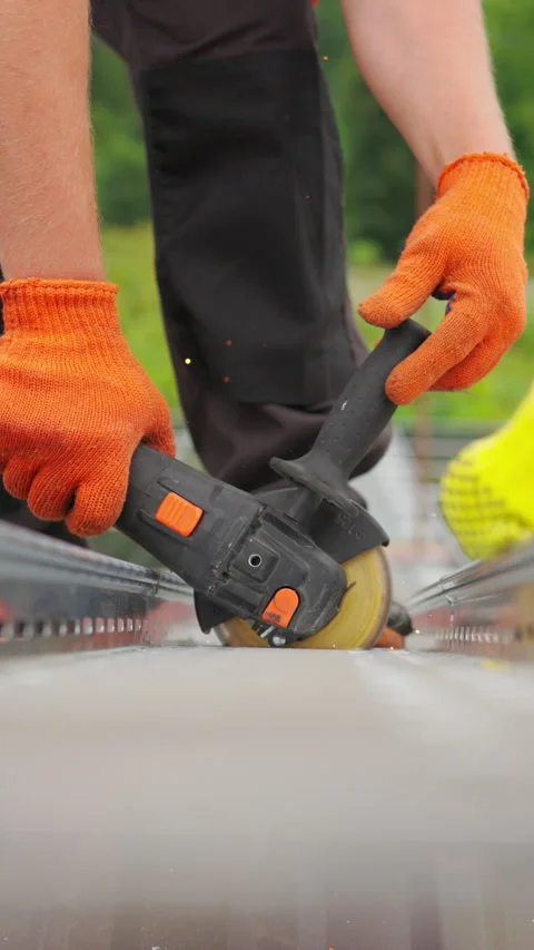 Vertical Screen: Slow motion of construction worker cutting steel beam. Man Stock Footage 272173906