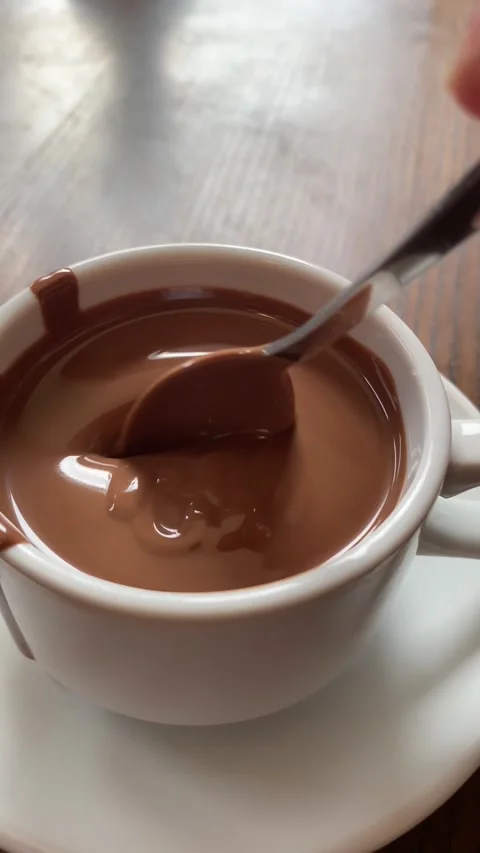 Vertical screen: Slow motion shot pouring melted chocolate, close-up seamless Stock Footage 263241135