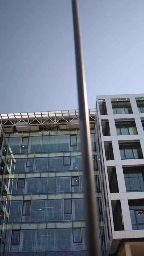 Vertical screen smart residential building with modern glass facade and geometri Stock Footage 312287214