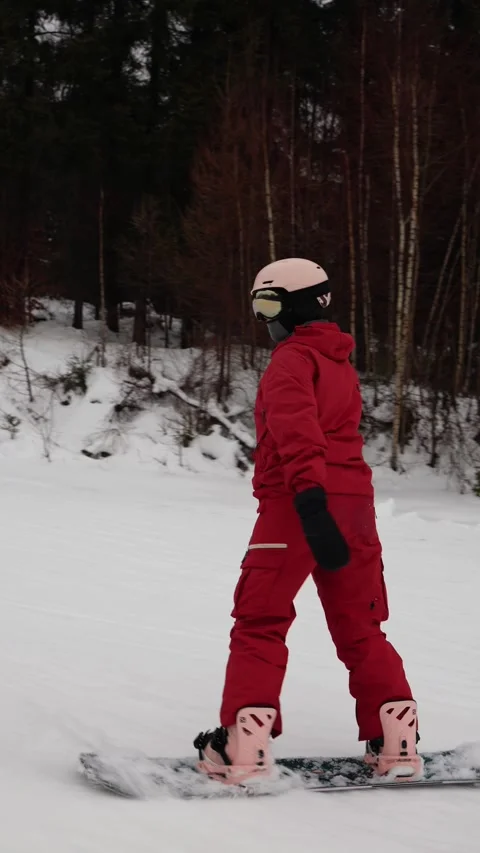 Vertical screen snowboarder posing confidently on slope Stock Footage 327092305