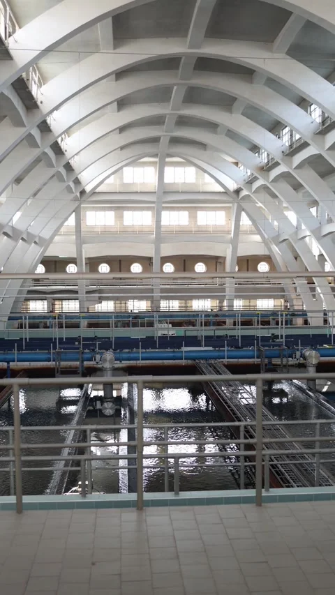 Vertical screen: Structural interior of a modern water treatment plant showcasin Stock Footage 304883942