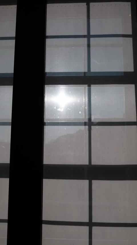 Vertical screen: The sun shines through a large window, casting geometric shadow Stock Footage 304459407