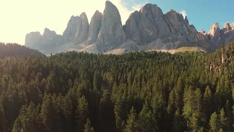 Vertical Screen Sunlit Dolomites Ridge And Pine Forest, Aerial Glide Revealing Stock Footage 325825257