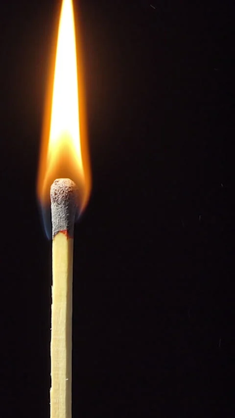 Vertical Screen: Super Slow Motion Macro Shot of Igniting Match against Black Stock Footage 232264993