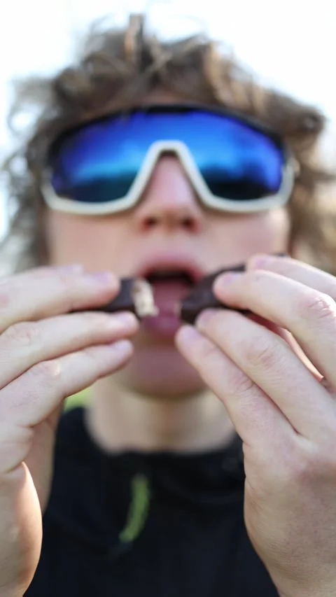 Vertical screen sweet addiction in full focus crispy layers soft filling dark ch Stock Footage 305999180
