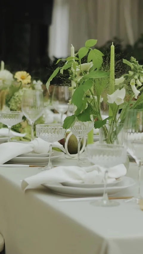Vertical screen: Table setting with plates, glasses for weddings. Decoration Stock Footage 306156087