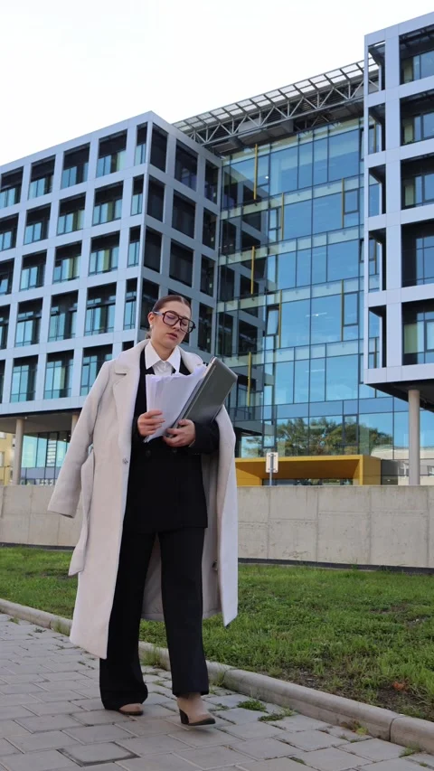 Vertical screen tired office worker drops papers 스톡 동영상 325453658