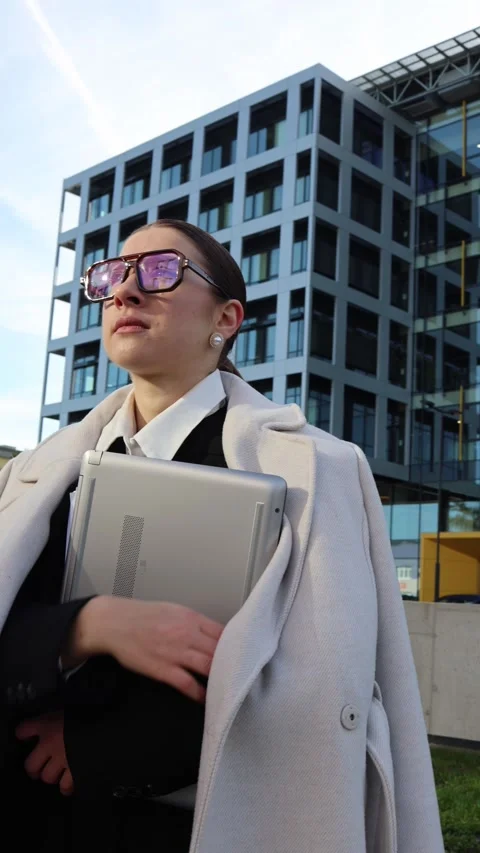 Vertical screen uncertain professional with laptop Stock Footage 325453725