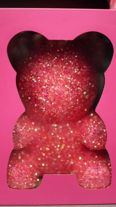 Vertical screen unsold glitter covered decorative bear figure displayed Stock Footage 330014777