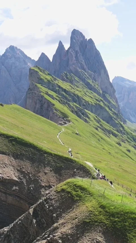 Vertical screen view of Seceda cliffs and green ridge in the Dolomites, Italy Stock Footage 318355894